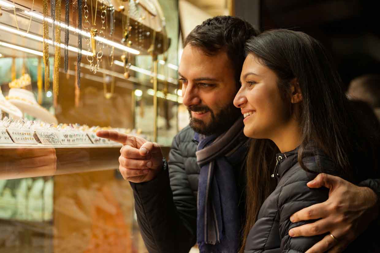 couple check wedding jewelry