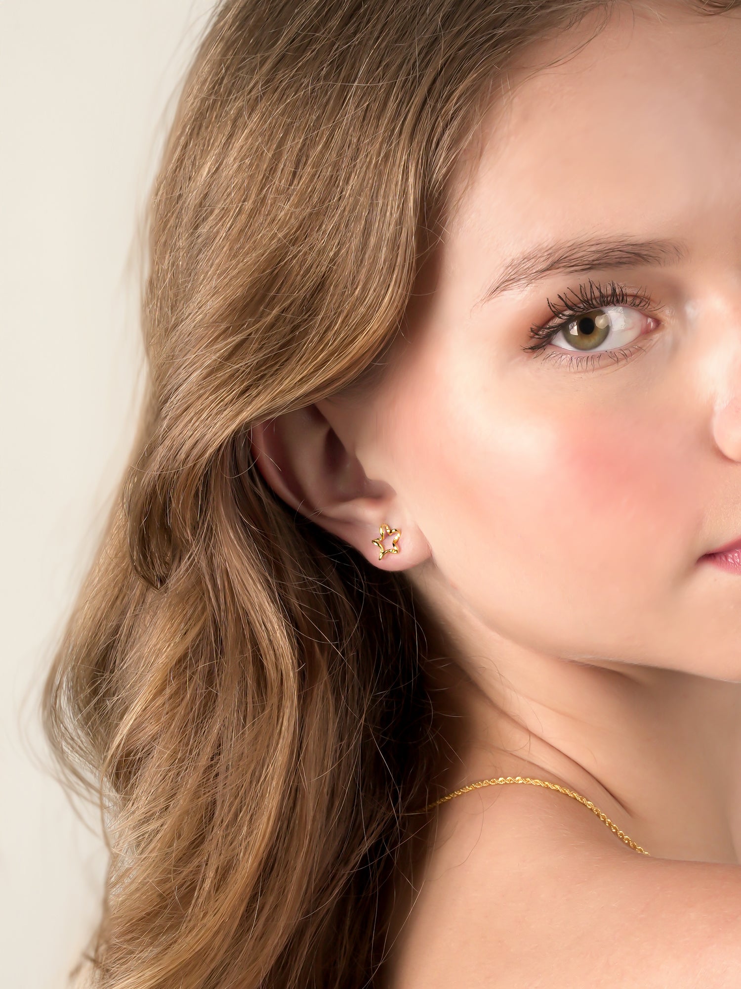 916 Gold Serpentine Star Earring